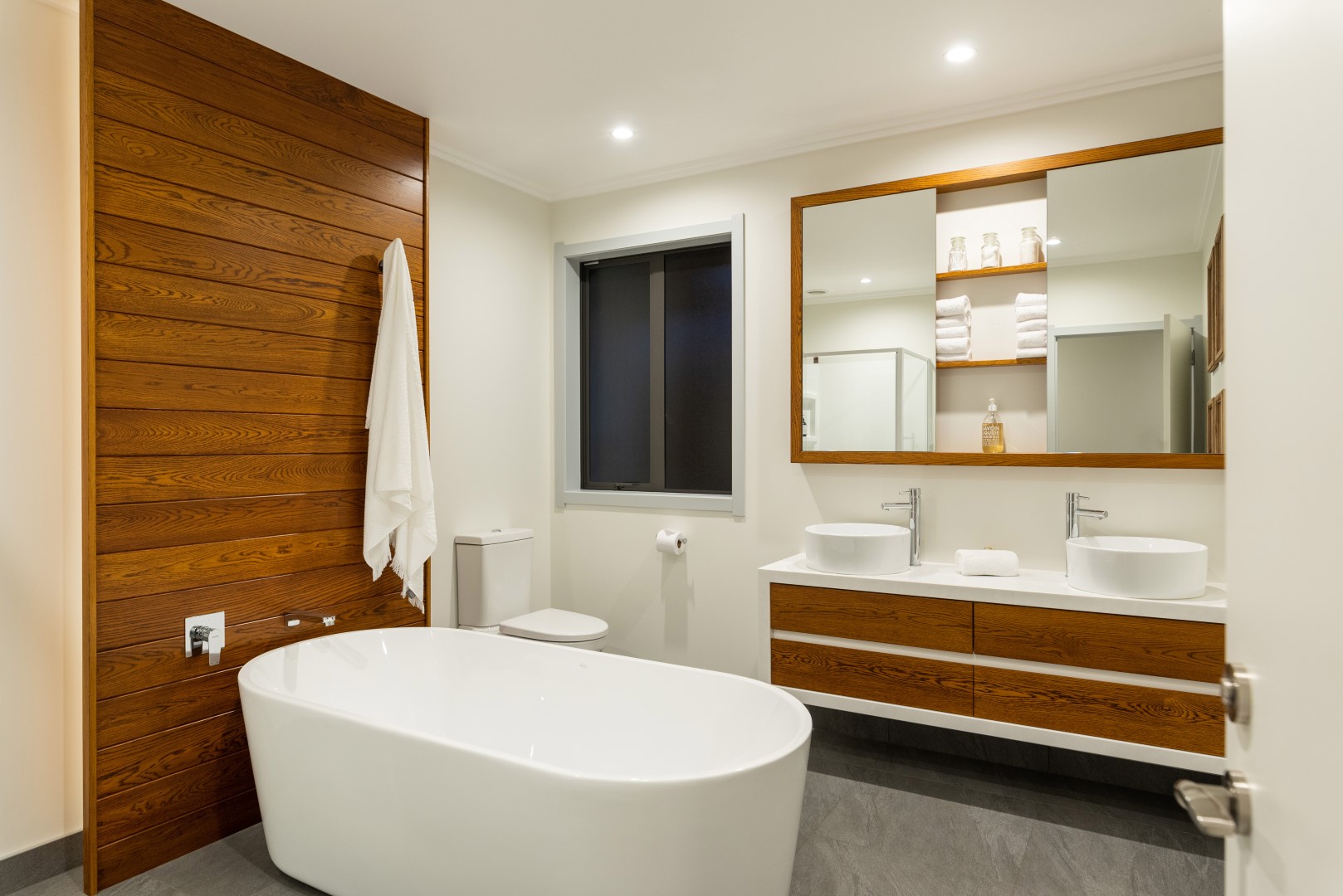 edkins-road-residence-arcline-kerikeri-architecture-white-timber-bathroom-wall-lining-cabinet-freestanding-bath