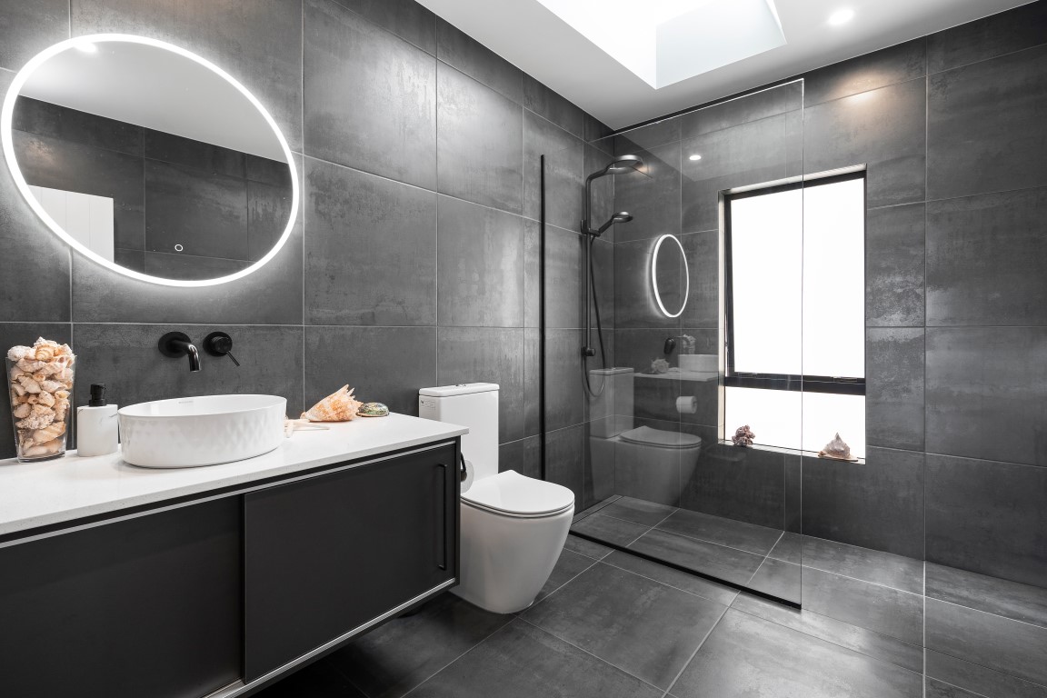 bathroom-design-arcline-architecture-dark-tile-black-white-vanity-black-shower-glass