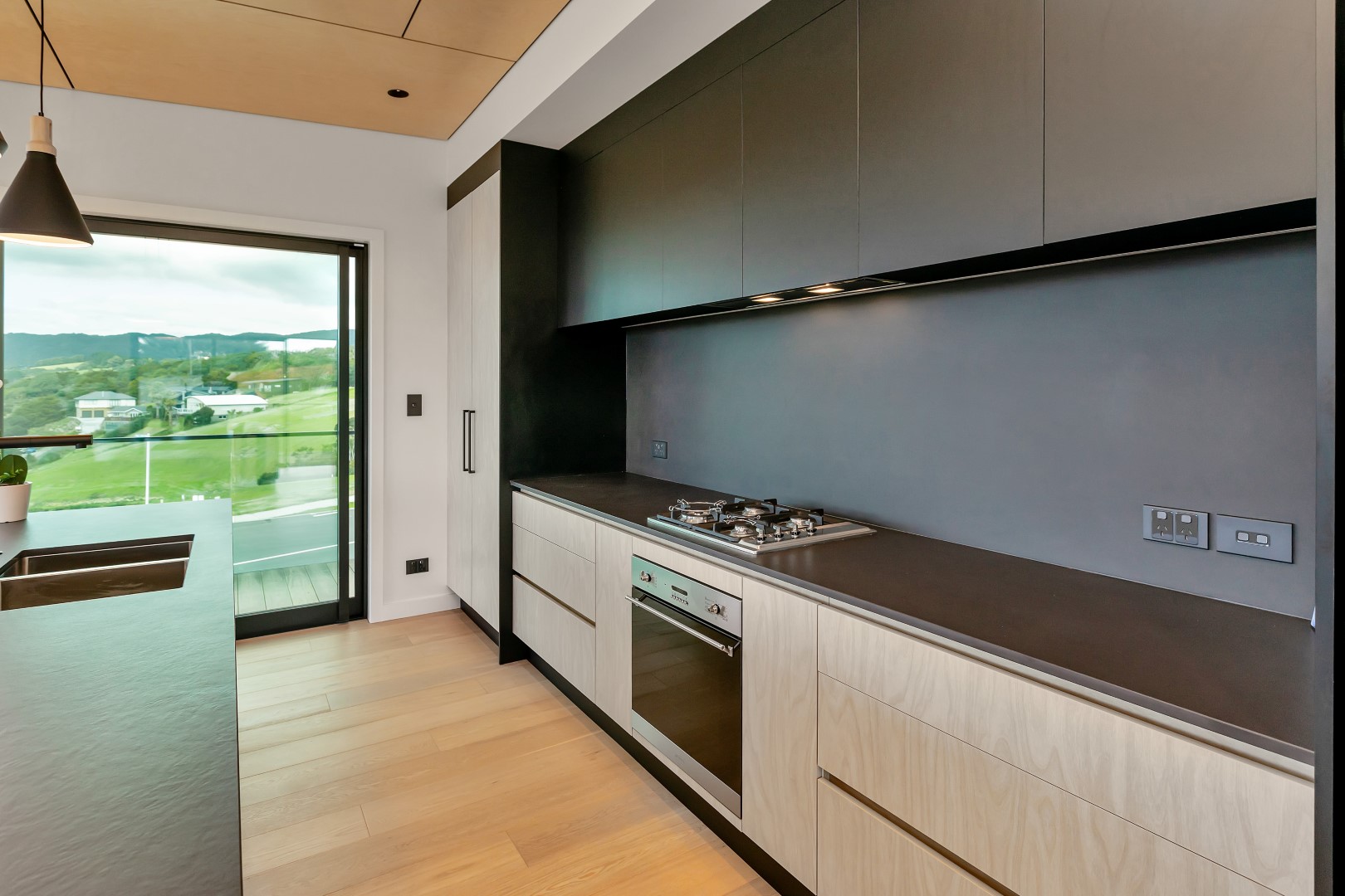 black-timber-look-kitchen-cabinet-arcline-architecture