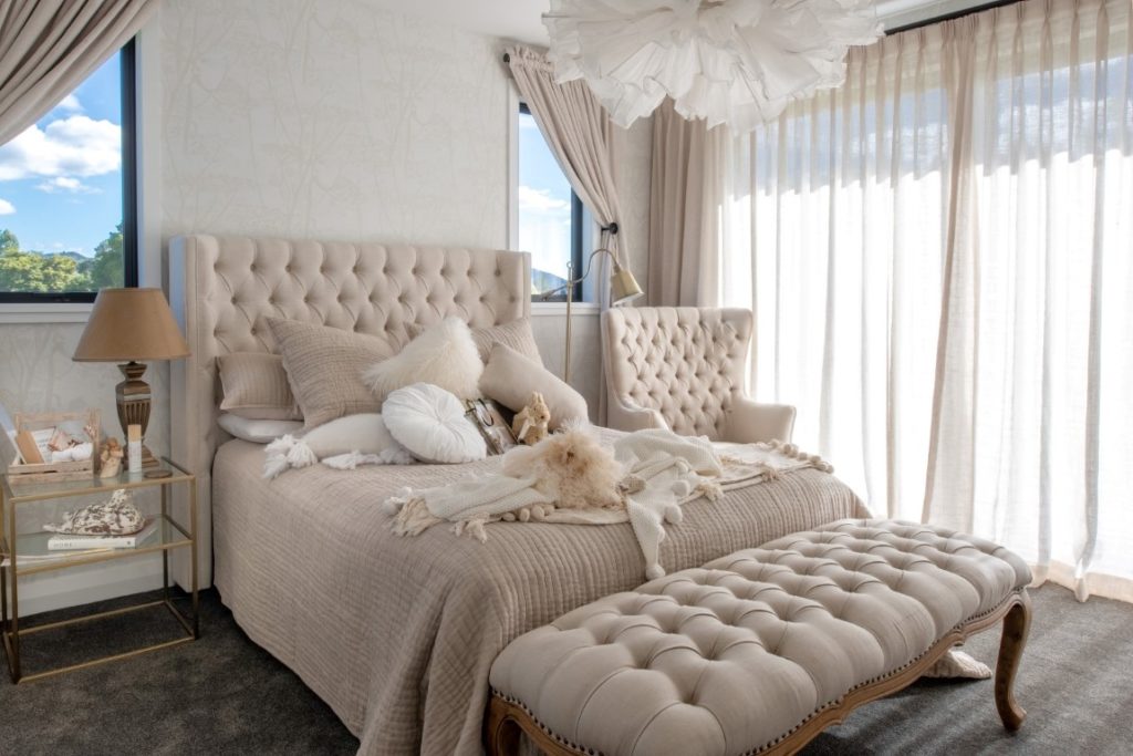 cream-bedroom-design-stylish-drapes-bedspread-cushions-lighting-bedside-table-arcline-architecture