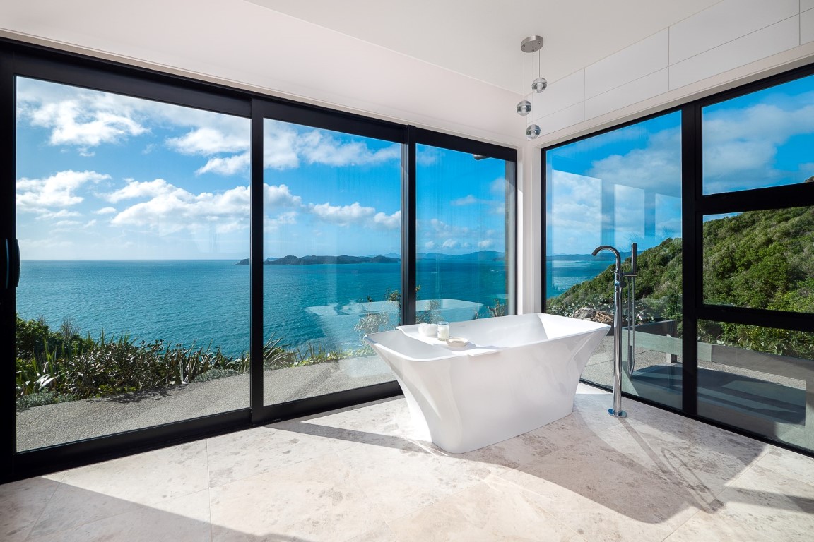 bath-with-amazing-view-arcline-architecture-bay-of-islands-northland-joinery-tiled-floor-water-spout