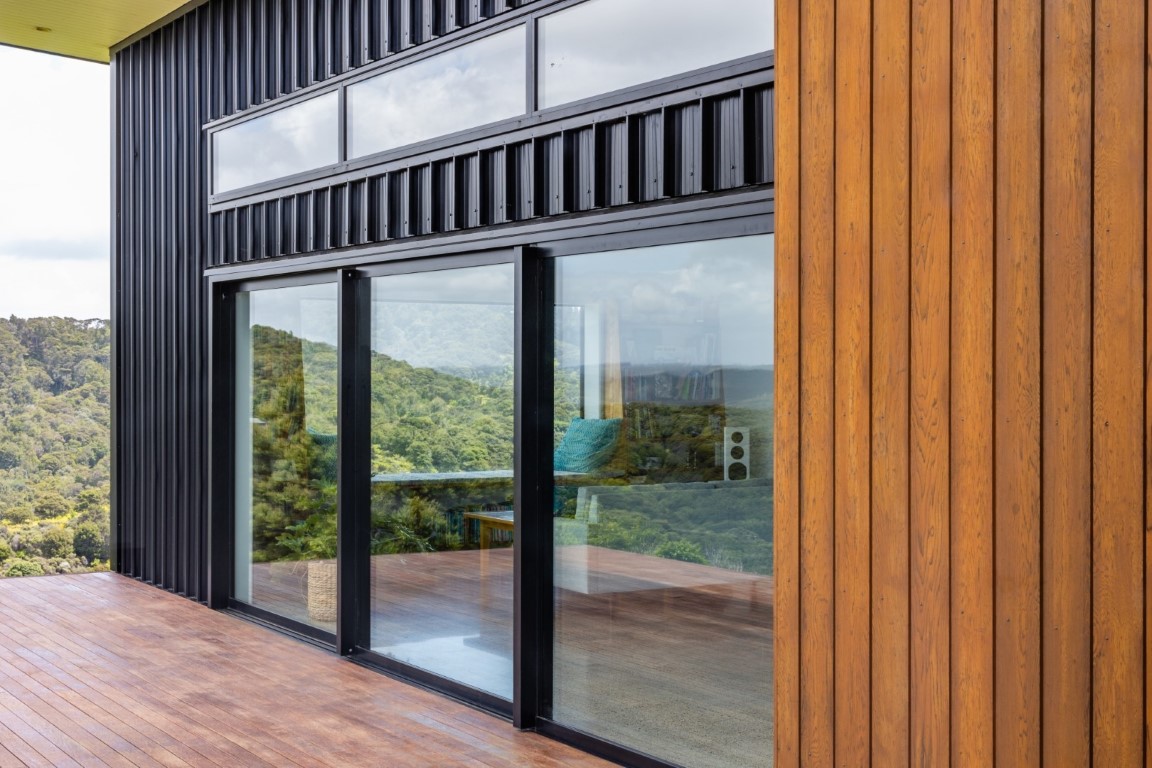 Black-house-cedar-deck-metdek-cladding-paroa-bay-view-arcline-architecture