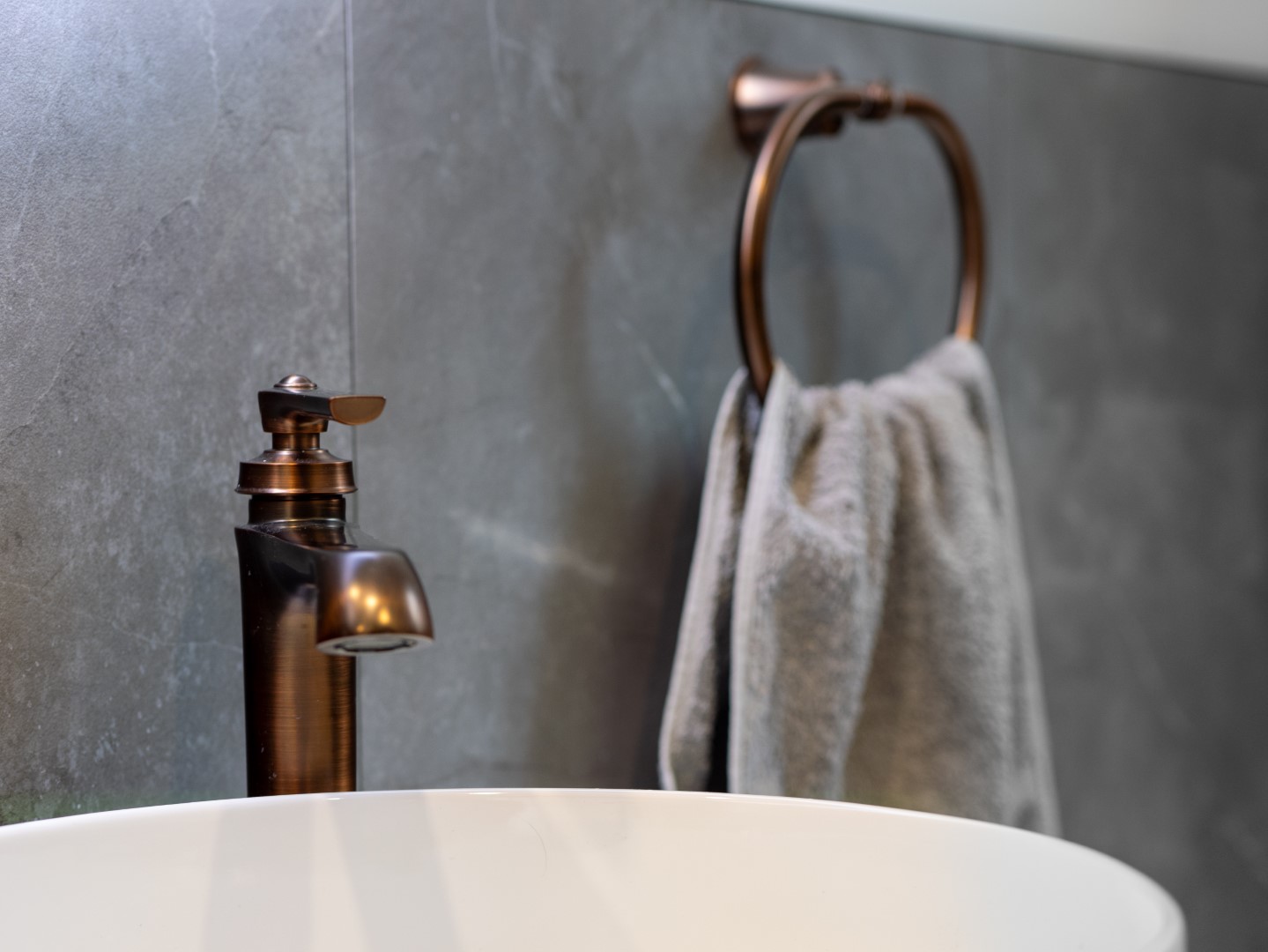 Old-and-new-brass-faucet-ovr-modern-basin-arcline-architecture