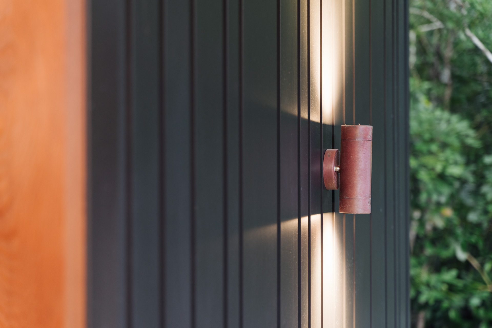 copper-light-on-nuwall-cladding-exterior-arcline-architecture