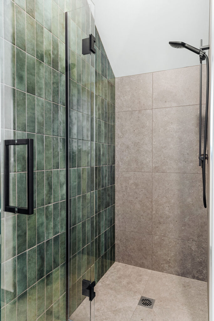 green-tiles-grey-black-hardware-shower-design-arcline-architecture