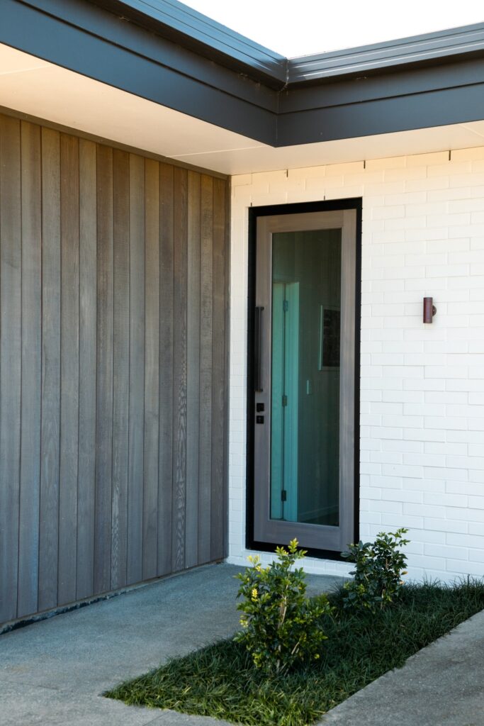 front-door-timber-glass-cedar-shiplap-painted-brick-white-cladding-arcline-architecture