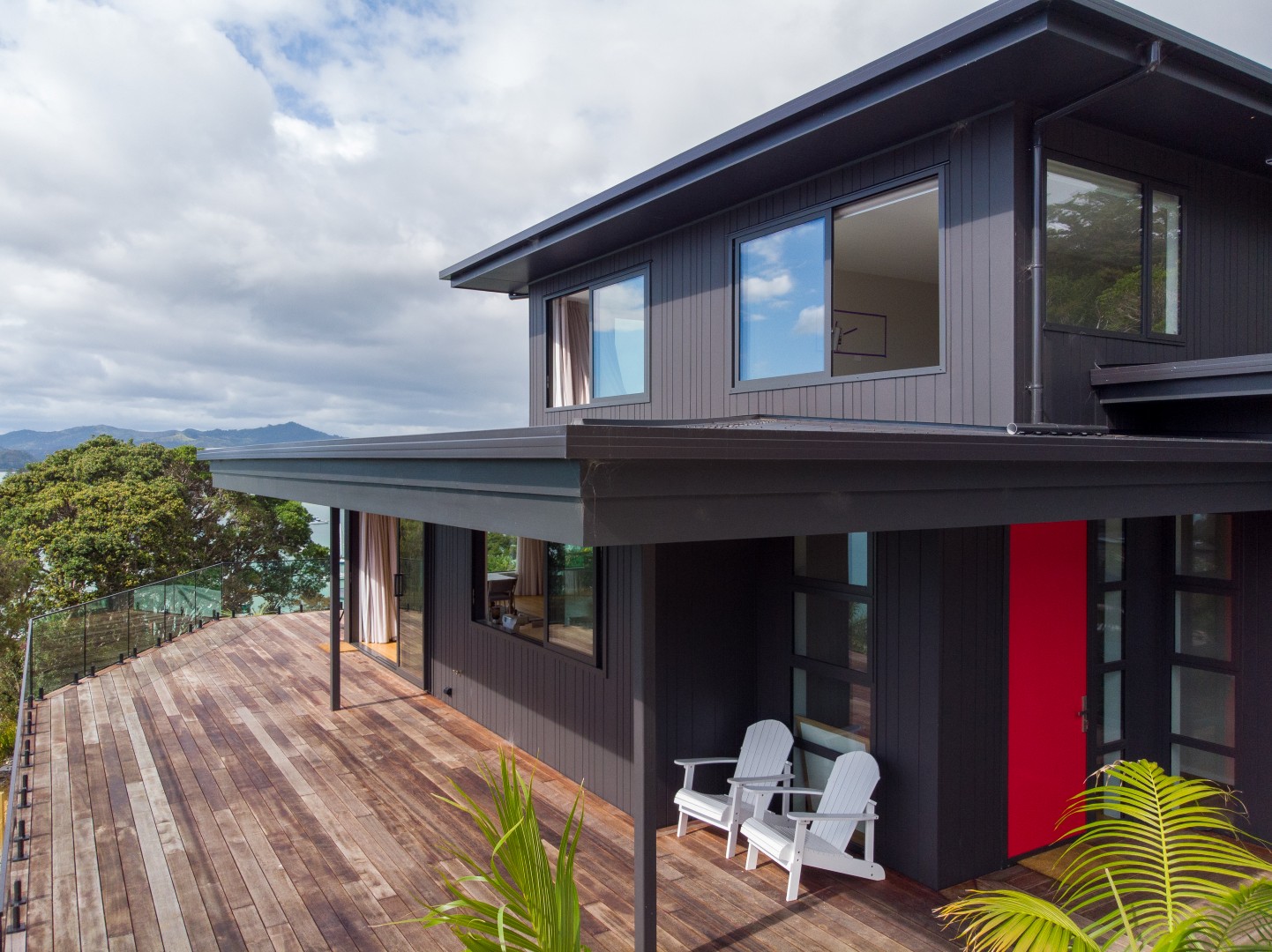 black-house-red-door-arcline-architecture-totara-north