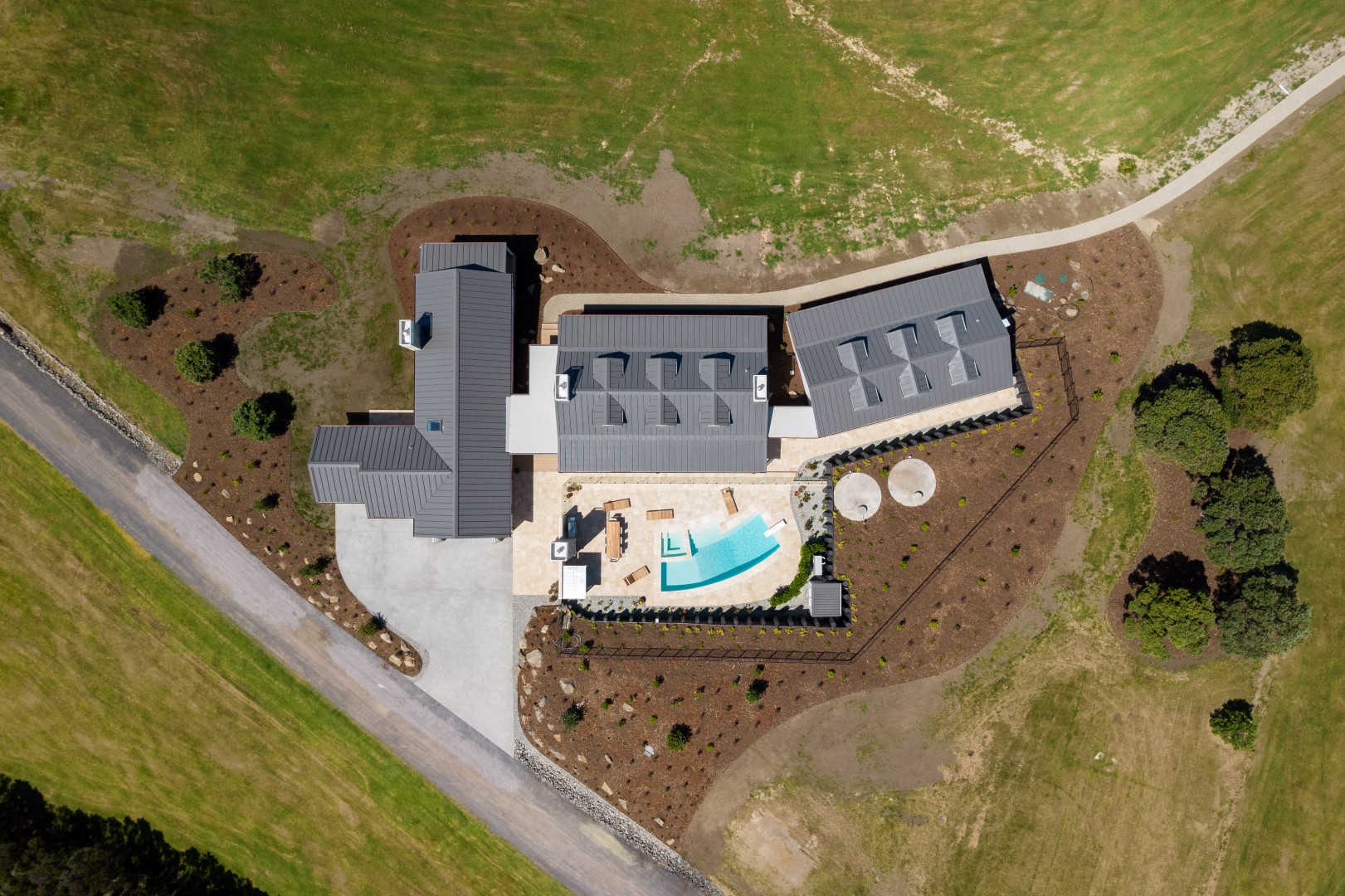 arcline-architecture-wiroa-station-residence-aerial-overhead-three-pod-layout-pool-courtyard