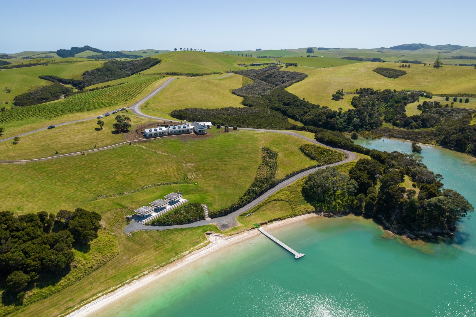 arcline-architecture-wiroa-station-residence-aerial-purerua-peninsula-vineyard-inlet