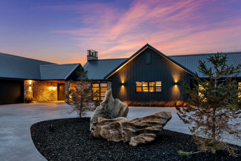 black-brick-house-landscaping-dusk-arcline-architecture
