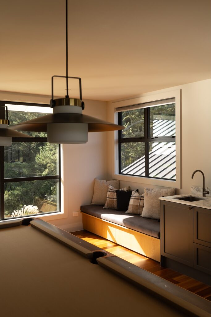 pool-table-bench-seat-window-kitchenette-entertaining-arcline-architecture