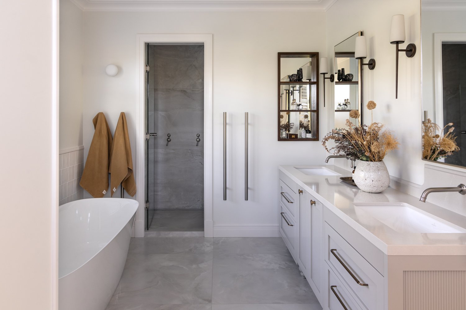 bathroom-with-freestanding-tub-walk-in-shower-and-double-vanity-arcline-architecture