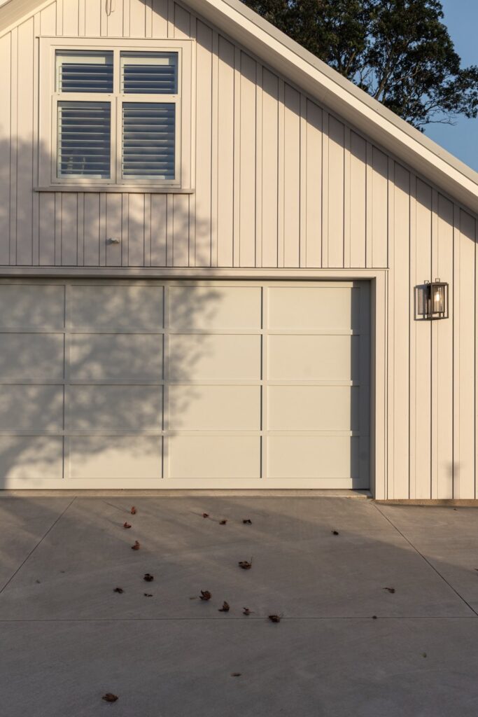 garage-gable-with-board-and-batten-cladding-and-shutter-window-arcline-architecture