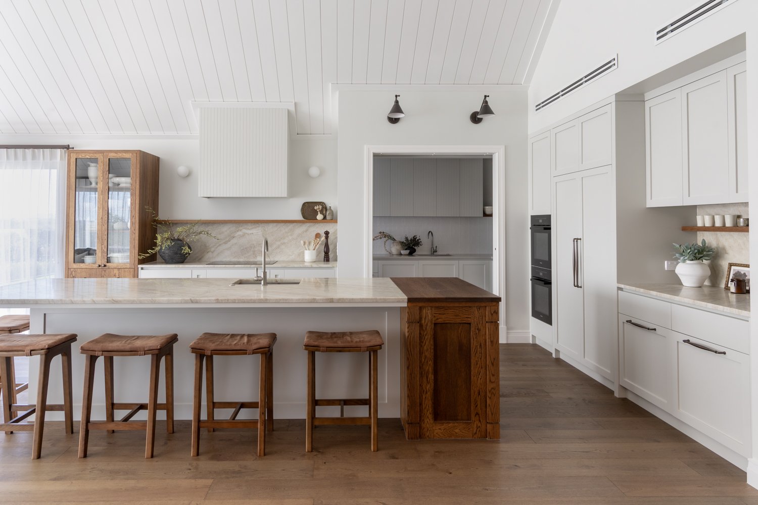 kitchen-with-island-marble-splashback-and-scullery-view-arcline-architecture