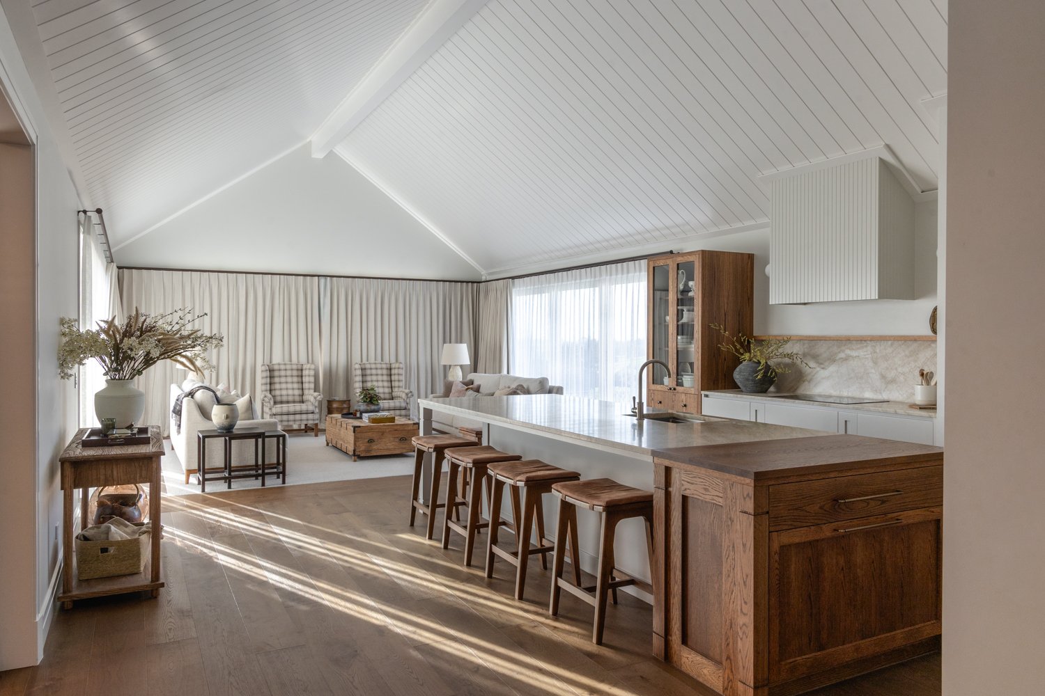 open-plan-living-and-kitchen-with-vaulted-shiplap-ceiling-arcline-architecture