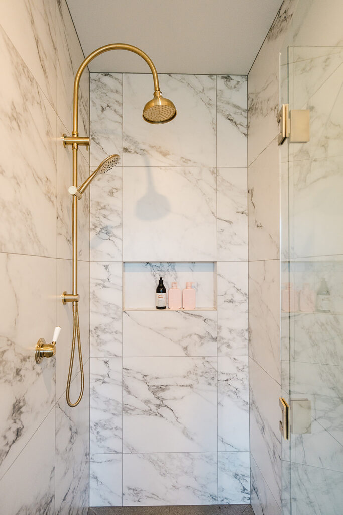 gold-rain-shower-marble-tiled-ensuite-whangarei-country-farmhouse