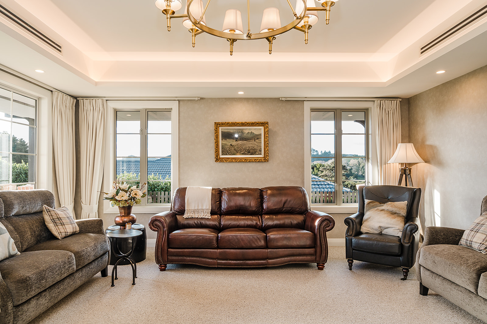 living-room-leather-sofa-chandelier-whangarei-country-farmhouse